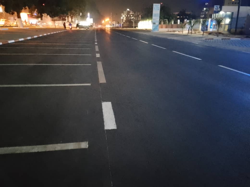 Aménagement de la voie en revêtement bitumineux et parking en pavé le long des immeubles longeant la RN1 depuis TOGOCOM à OTR